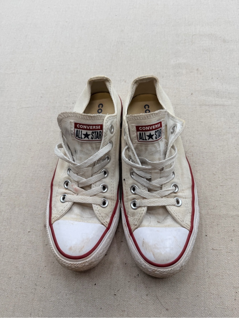 Converse White Low Top Sneakers with Red Trim
